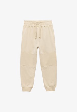 Kahdenväriset jogger-housut elastisella vyötäröllä, nyöri, sivutaskut ja teksturoitu paneeli polvissa. Pehmeä kangas, jossa on resorit.