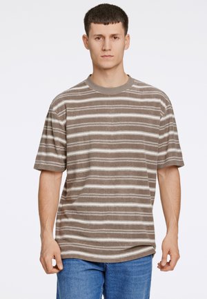 Brown and cream striped short-sleeve t-shirt with a crew neck, displayed on a male model. Casual fit with soft texture.