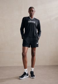 adidas Sportswear TIRO CUT STRIPES JACQUARD SHORTS - Športové šortky - black