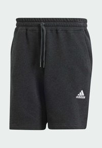 Pantalones cortos de algodón gris oscuro con cintura elástica y cordón ajustable. Presentan un logo blanco de Adidas en la parte inferior izquierda.