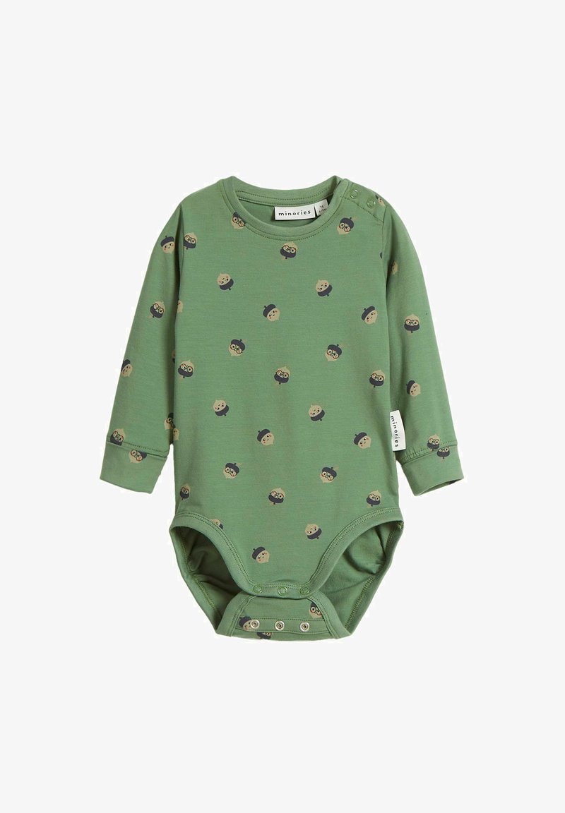 Grön långärmad bodysuit i mjuk bomull, med ett mönster av tecknade ansikten i olika färger. Tryckknappar i botten.