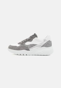 Gray and white sneaker with a combination of suede and textile materials, featuring a thick white sole and metallic accents on the side.