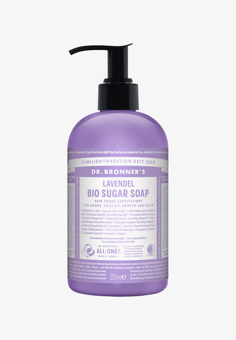 Botella de bomba de plástico morada con una bomba negra, etiquetada "Jabón de Azúcar Bio de Lavanda" en texto blanco, que contiene 355 ml de jabón para manos, cara y cuerpo.