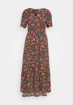 Robe maxi florale noire avec des fleurs roses, orange et vertes. Présente des manches bouffantes courtes et un lien au niveau du col.