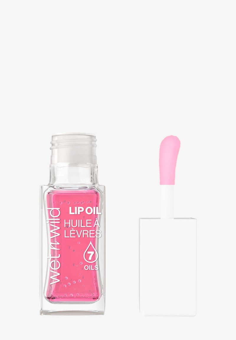 Transparent glasflaska som innehåller klar rosa läppolja med synliga bubblor; vit rektangulär applicator med en mjuk rosa spets.