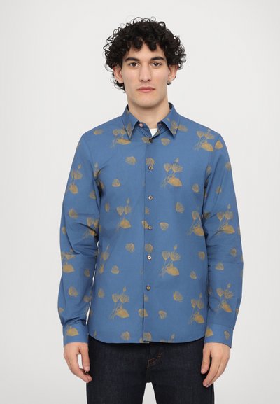 Blue long-sleeve shirt with a floral pattern in gold. Features a button-down collar and brown buttons, made of a smooth fabric.
