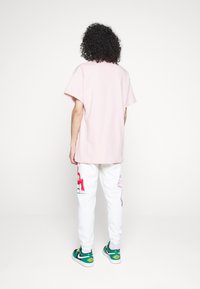 Nike Sportswear T-shirt - bas - pink
