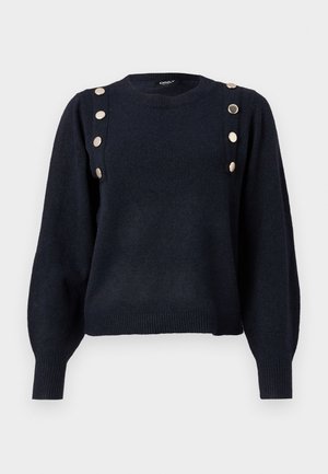 Sötét tengerészkék kötött pulóver kerek nyakkivágással, hosszú puffos ujjakkal és díszes arany gombokkal a bal vállon. Ribbed szegély.