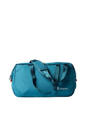 Blue Cotopaxi duffel bag with black shoulder straps and a zippered main compartment on a white background.