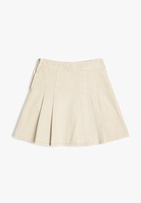 Beige geplooide rok van katoen, met een ritssluiting en een uitlopende vorm die tot halverwege de dij reikt.