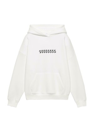 Biela mikina s kapucňou, ktorá má v strede rad čiernych hviezd, predné klokanie vrecko a šnúrky na kapucni. Mäkká látka s hladkým povrchom.