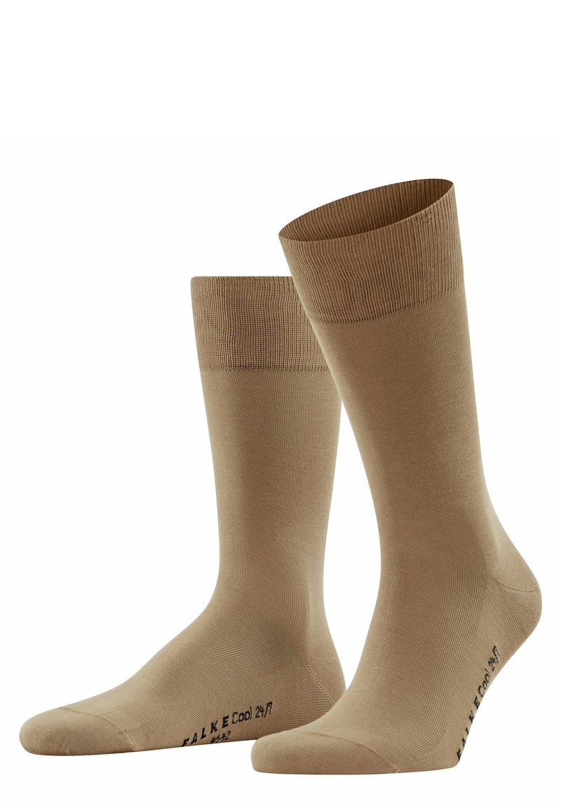 Beige crew socks made of smooth fabric with a ribbed cuff. Features a reinforced heel and toe, labeled with "FALKE Cool 24/7".