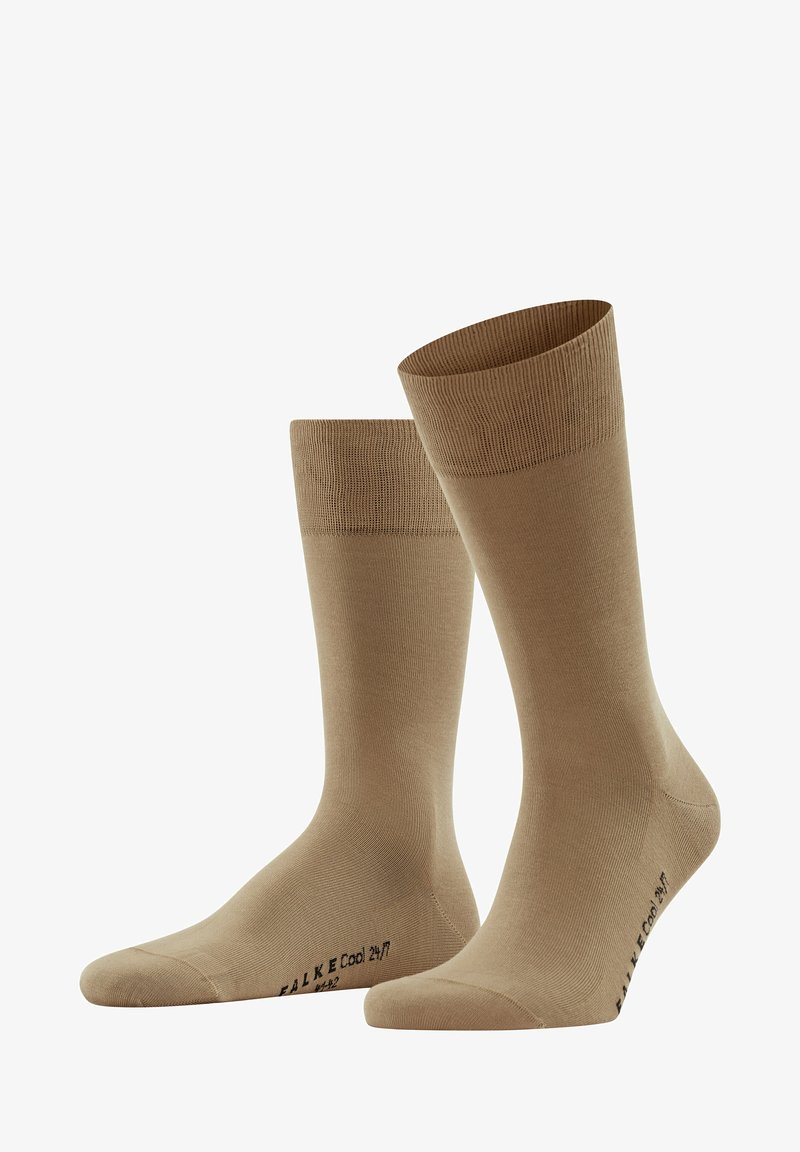 Beige crew socks made of smooth fabric with a ribbed cuff. Features a reinforced heel and toe, labeled with "FALKE Cool 24/7".