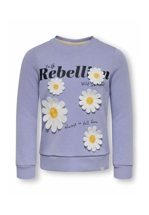 Sweat lavande avec de grandes marguerites blanches et jaunes et texte noir indiquant « so off Rebellion wild at heart always in full bloom. »