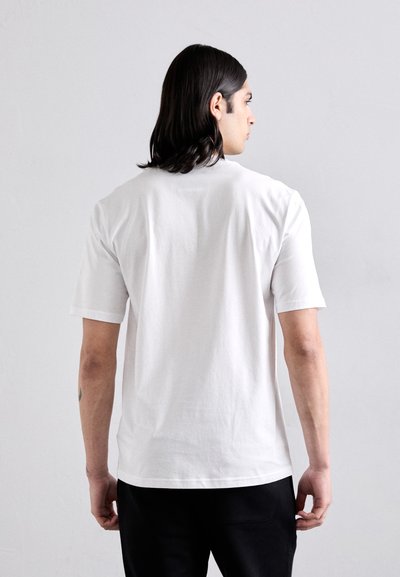 MOSCHINO T-shirt imprimé - fantasia bianco