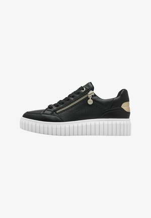 Black sneaker with a textured upper, featuring a side zipper, white thick sole, and gold accent hardware. Classic lace-up design.