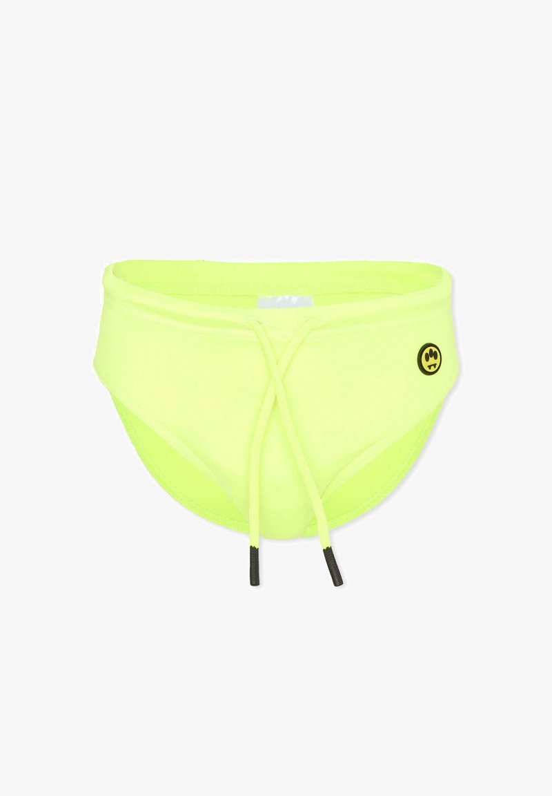 Slip de bain jaune vif avec cordon de serrage ajustable à l'avant et un petit logo smiley noir et jaune sur le côté droit.