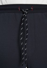 Jan Vanderstorm VEGAR - Tracksuit bottoms - dunkelblau