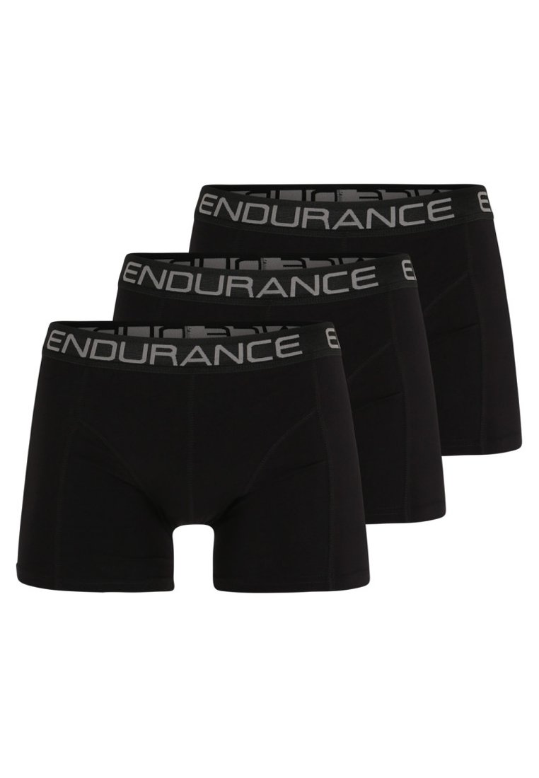 Culottes nere in un pacco da tre con un'ampia vita grigia su cui è stampato "ENDURANCE". Il tessuto ha una texture liscia e elasticizzata.