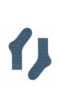 Calzini a coste blu scuro con un motivo testurizzato, dotati di un bordo aderente e con tallone e punta rinforzati. Materiale a maglia leggero.