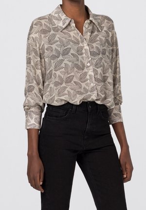 Blusa - beige