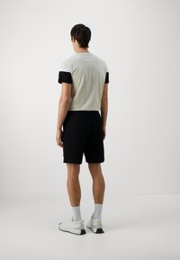EA7 Emporio Armani Pantaloni sportivi - nero