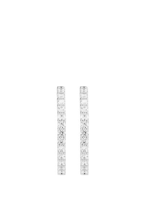 Pair of slim silver hoop earrings encrusted with small round clear gemstones, displayed against a white background.