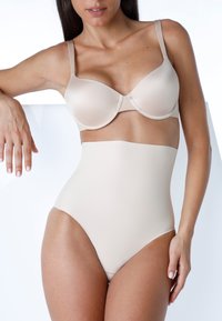 Reggiseno senza cuciture e shapewear a vita alta; tessuto liscio; spalline regolabili; coppe sagomate; design senza cuciture; texture morbida; linee curve.
