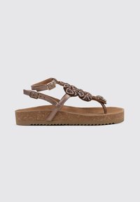 Sandales marron avec une semelle en liège texturé, une sangle décorative avec des accents tressés et perlés, et des brides de cheville réglables.