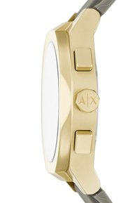 Złoty zegarek z teksturowaną obwódką, dwoma przyciskami oraz szarym paskiem silikonowym. Posiada minimalistyczny okrągły design i czystą tarczę.