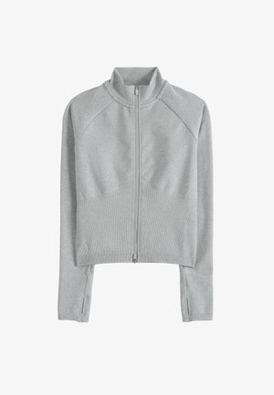 Sudadera recortada gris claro con cuello alto, cremallera frontal, detalles acanalados y mangas largas tipo raglán con aberturas laterales en los puños.