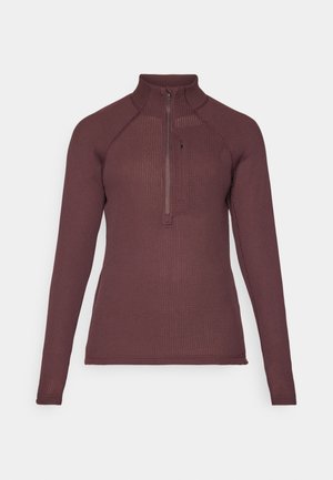 Top lung cu mânecă lungă burgundă, cu guler înalt, fermoar parțial frontal, textură structurată și design ajustat. Potrivit pentru a fi purtat la strat în îmbrăcămintea sport.