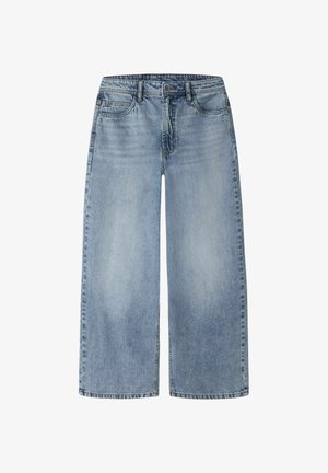 Helehallid laia säärega teksapüksid kõrge vöökohaga, esitaskud ja õmblusdetailid. Erinevaid mustreid pole; kogu pind on ühtlase tekstuuriga.