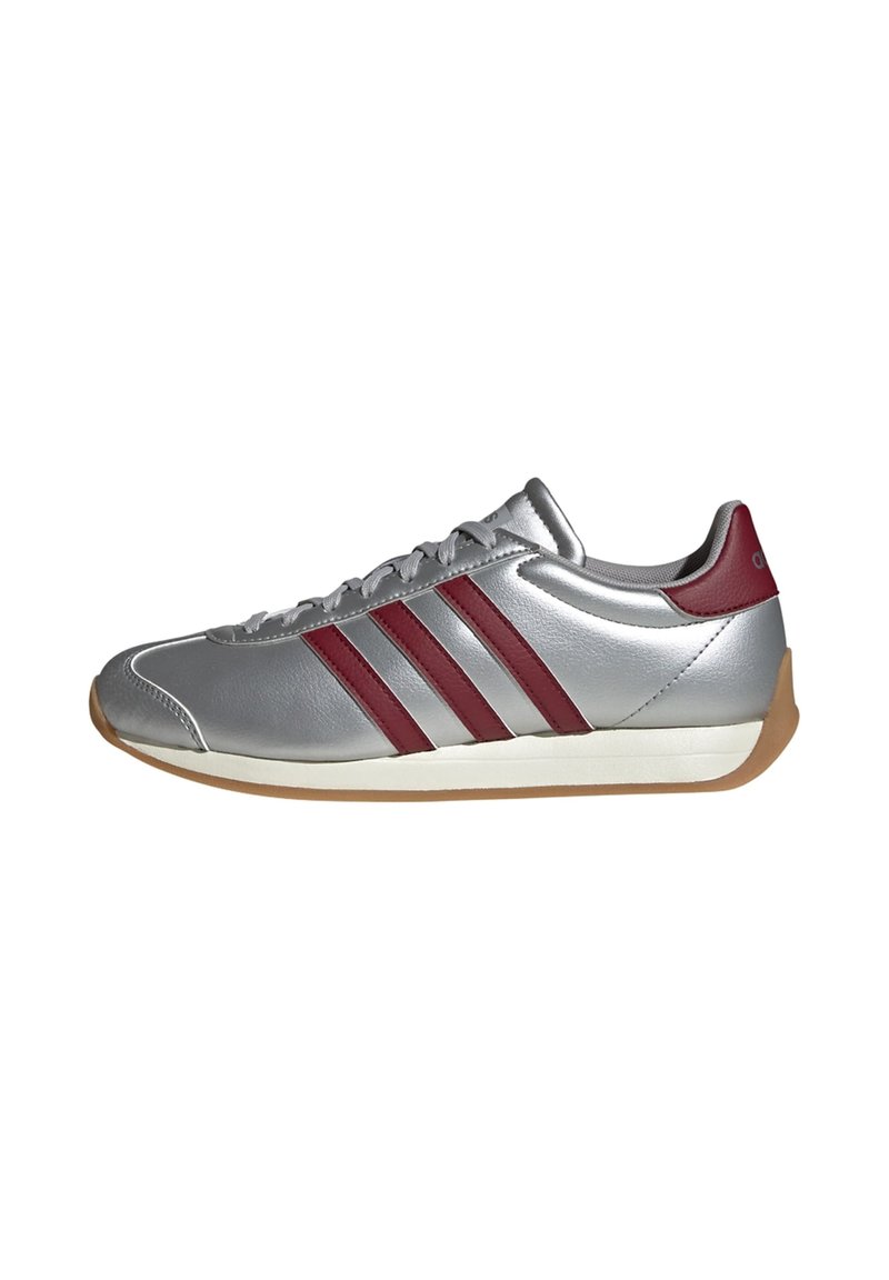 Silver athletic shoe with three burgundy stripes, sleek design, smooth texture, rubber gum sole, and lace-up closure.