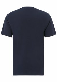 T-shirt en coton bleu marine à manches courtes et col rond. Le dos présente un design lisse et uni sans graphiques ni embellissements.