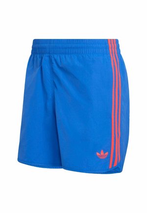 Niebieskie spodenki sportowe z elastycznym paskiem w talii, ozdobione dwoma pionowymi pomarańczowymi paskami i małym logo przy krawędzi.