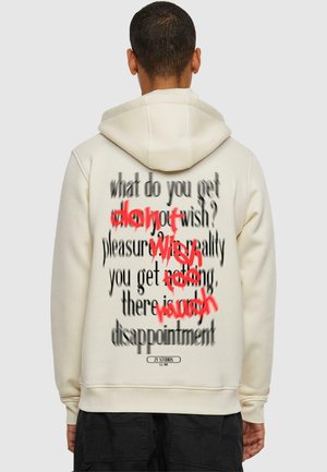 Cream-colored hoodie featuring black and red text on the back, with a soft texture and front kangaroo pocket. Hood attached.