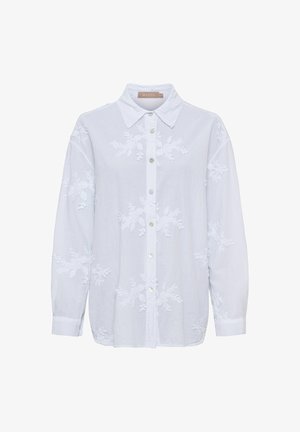 Hvid skjorte med lange ærmer og knapper, med blomsterbroderi og spids krave, mærket "Marta" på indersiden af kraven.