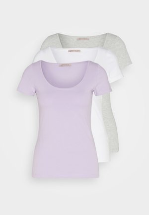 Three short-sleeved t-shirts in lilac, white, and gray. Made of soft cotton, featuring a round neckline and fitted design.