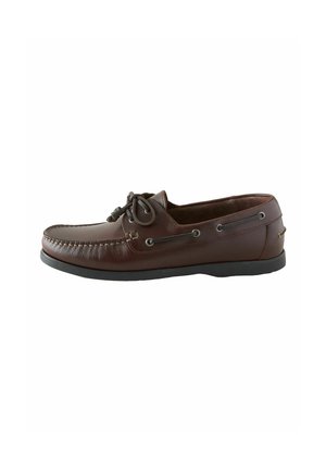 Dark brown leather moccasin-style men's shoe with lace-up detail and black rubber sole on white background.