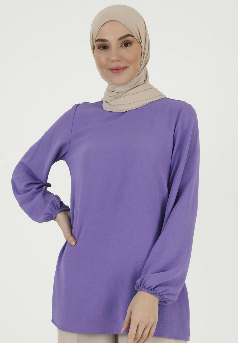 Purple long-sleeve top with gathered cuffs, made of lightweight fabric; features a round neckline and a relaxed fit.