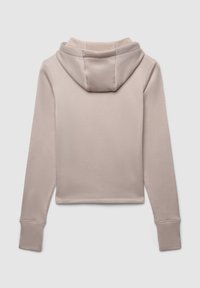 Felpa cropped in morbido tessuto beige tenue. Presenta un cappuccio, maniche lunghe e polsini a coste. Texture liscia con dettagli di cucitura minimi.