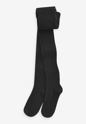 Schwarze gerippte Strumpfhosen mit glatter Textur, die eine enge Passform und tapered Beine aufweisen, oben ordentlich für die Aufbewahrung gerollt.