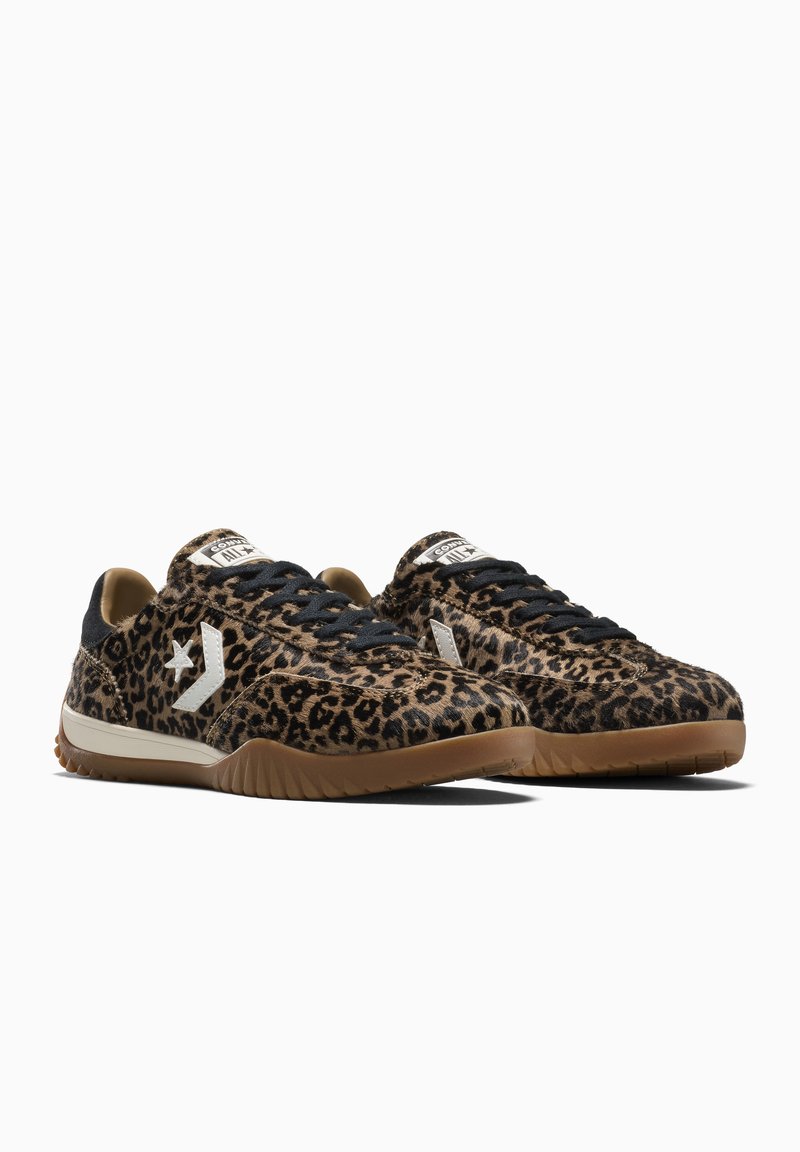 Pair of low-top sneakers with leopard print, black laces, white logo on the side, and brown rubber soles on a white background.