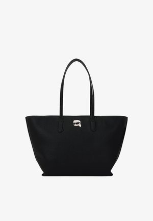 Sac en cuir noir avec surface texturée, double poignée et détail logo argenté. Large ouverture et design spacieux pour un accès facile.