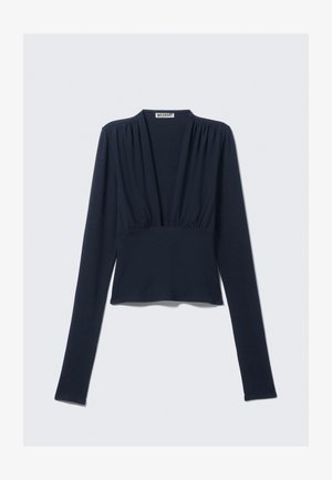 Mornarsko modra dolga majica z V-izrezom, nabranimi rameni in oprijetim pasom, izdelana iz gladkega in raztegljivega materiala.