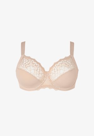 Reggiseno beige con sovrapposizione di pizzo floreale, coppe morbide e spalline in rete regolabili. Presenta bordi ondulati delicati e una chiusura con gancio e occhiello.