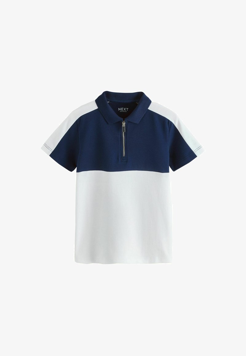 Polo avec un design color block bleu marine et blanc, manches courtes, et col zippé. Fabriqué en coton doux.