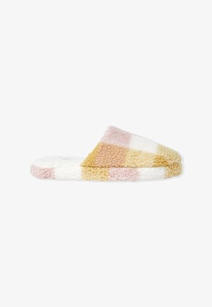 Pantofole slip-on testurizzate in bianco, rosa e giallo a motivo quadrettato. Realizzate in materiale morbido con una suola spessa e soffice.