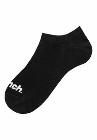 Calzino nero a caviglia con texture a coste e logo bianco "bunch." sul lato esterno. Punta arrotondata e design corto adatto per l'abbigliamento casual.